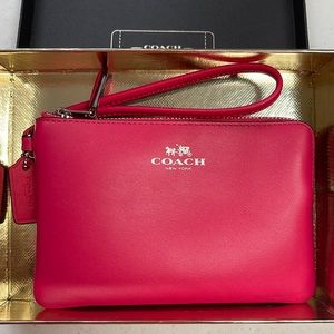 Coach pink leather wristlet